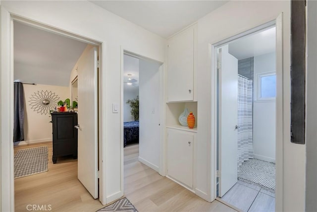 14453 Watkins Dr, La Mirada, CA 90638 - hall featuring light wood finished floors and baseboards