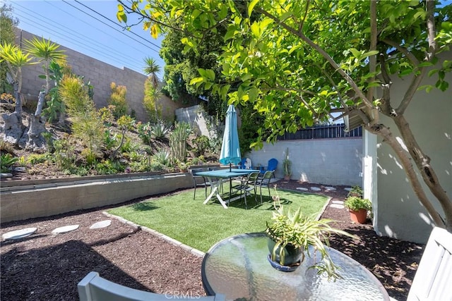 14453 Watkins Dr, La Mirada, CA 90638 - fenced backyard with outdoor dining area