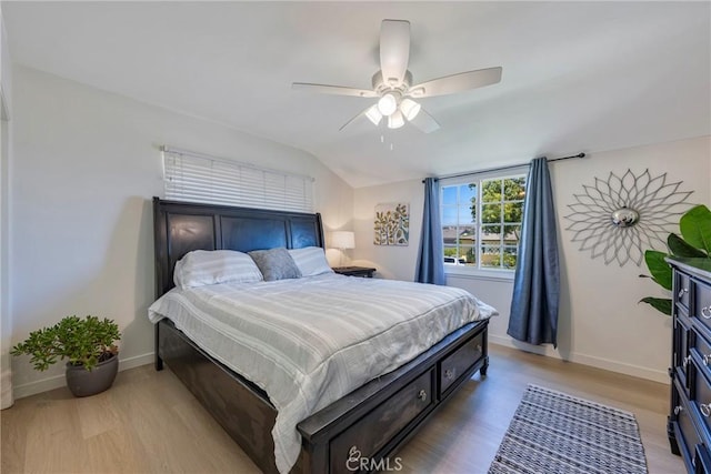 14453 Watkins Dr, La Mirada, CA 90638 - bedroom featuring light wood-style floors, lofted ceiling, and ceiling fan