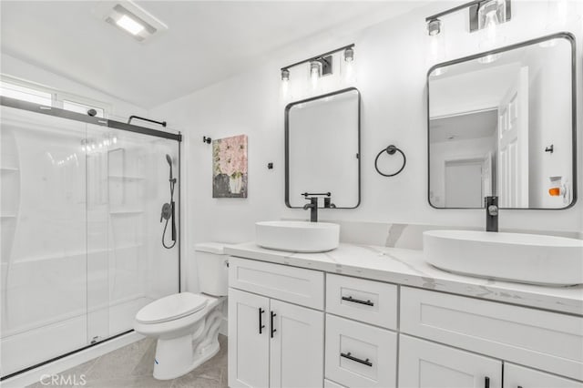 5619 Daisy Ave Unit 29, Palms, CA 92277 - full bath featuring a stall shower, double vanity, and lofted ceiling