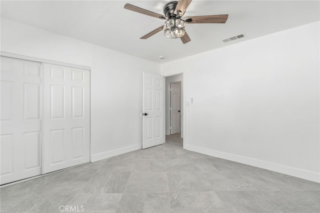 5619 Daisy Ave Unit 29, Palms, CA 92277 - unfurnished bedroom featuring a closet and a ceiling fan