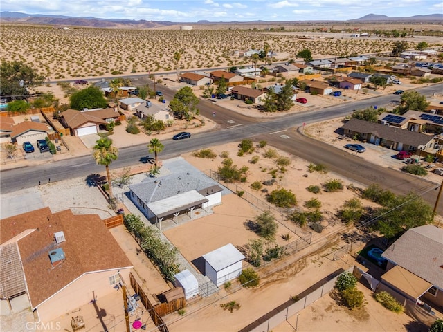 5619 Daisy Ave Unit 29, Palms, CA 92277 - aerial perspective of suburban area with a mountain backdrop