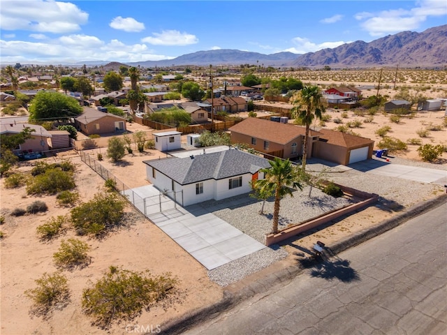5619 Daisy Ave Unit 29, Palms, CA 92277 - aerial perspective of suburban area with mountains and a desert landscape
