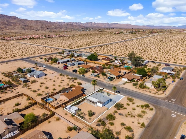 5619 Daisy Ave Unit 29, Palms, CA 92277 - aerial view of sparsely populated area featuring property boundaries highlighted and nearby suburban area