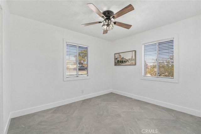 5619 Daisy Ave Unit 29, Palms, CA 92277 - spare room with baseboards and a ceiling fan