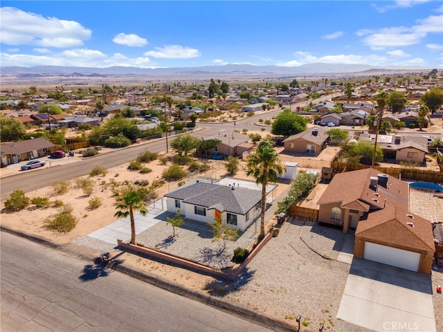 5619 Daisy Ave Unit 29, Palms, CA 92277 - aerial perspective of suburban area with a mountain backdrop