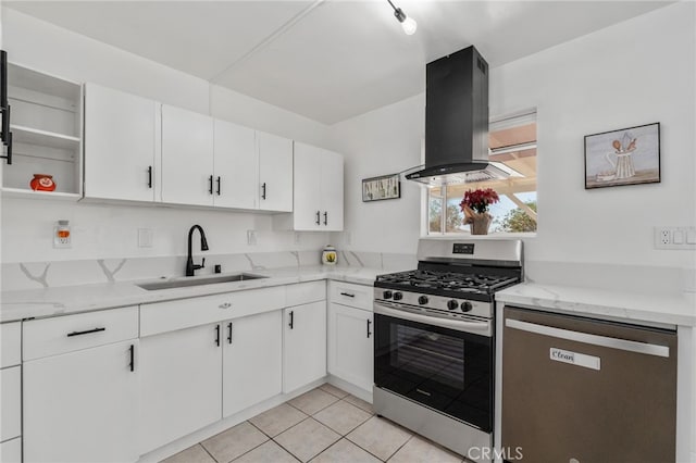 5619 Daisy Ave Unit 29, Palms, CA 92277 - kitchen with appliances with stainless steel finishes, exhaust hood, white cabinets, light stone counters, and light tile patterned floors