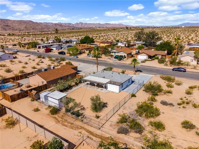 5619 Daisy Ave Unit 29, Palms, CA 92277 - aerial perspective of suburban area with mountains and a desert landscape