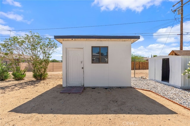5619 Daisy Ave Unit 29, Palms, CA 92277 - view of shed with a fenced backyard