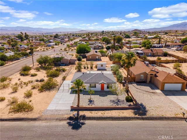 5619 Daisy Ave Unit 29, Palms, CA 92277 - aerial perspective of suburban area with a mountainous background