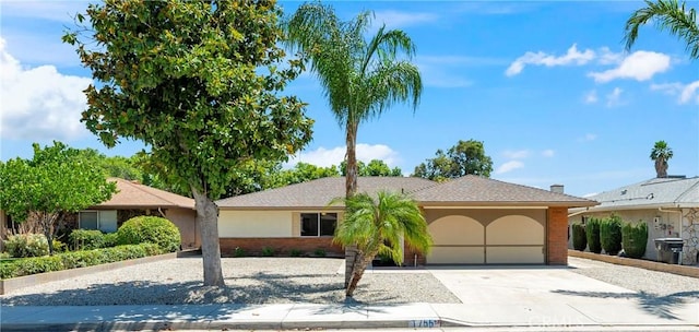 1755 Matthew Ln, Hemet, CA 92545 - single story home with driveway, brick siding, and a garage