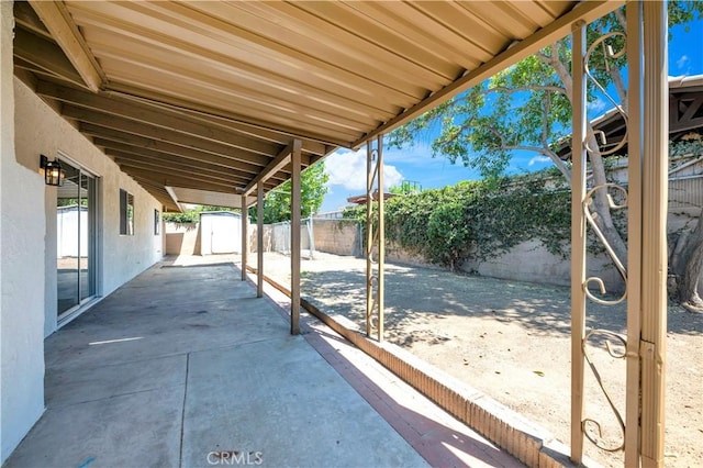 1755 Matthew Ln, Hemet, CA 92545 - fenced backyard featuring a shed and a patio area