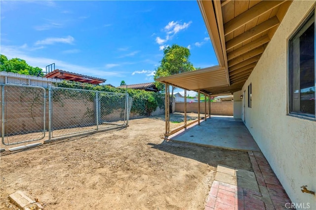 1755 Matthew Ln, Hemet, CA 92545 - fenced backyard with a patio