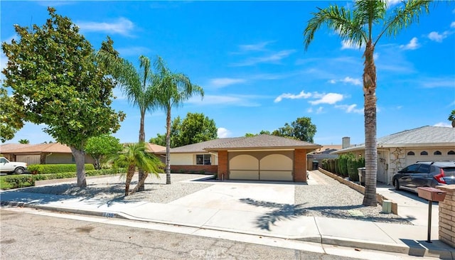 1755 Matthew Ln, Hemet, CA 92545 - ranch-style home with concrete driveway and an attached garage