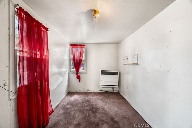9804 Palmetto Ave, Fontana, CA 92335 - unfurnished room with heating unit and carpet floors