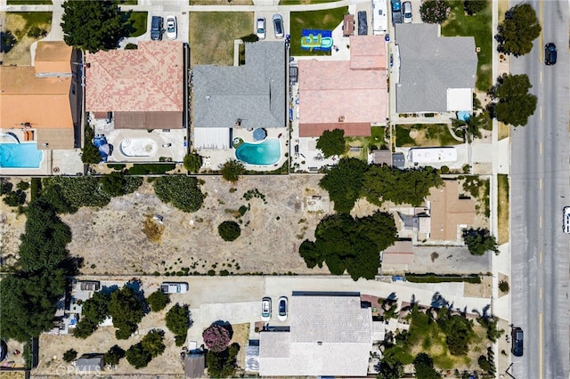 9804 Palmetto Ave, Fontana, CA 92335 - aerial view of property and surrounding area featuring a pool area