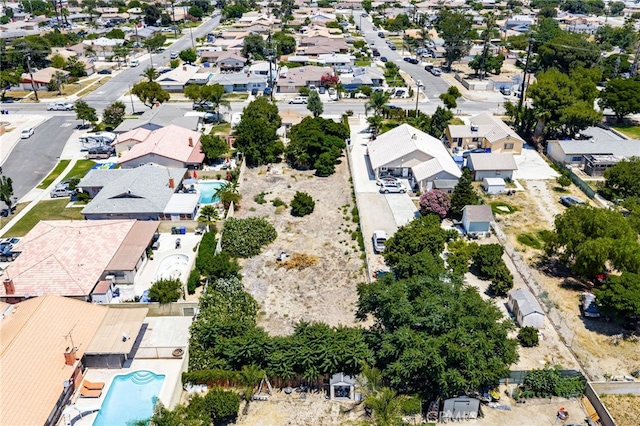 9804 Palmetto Ave, Fontana, CA 92335 - aerial perspective of suburban area featuring a pool area