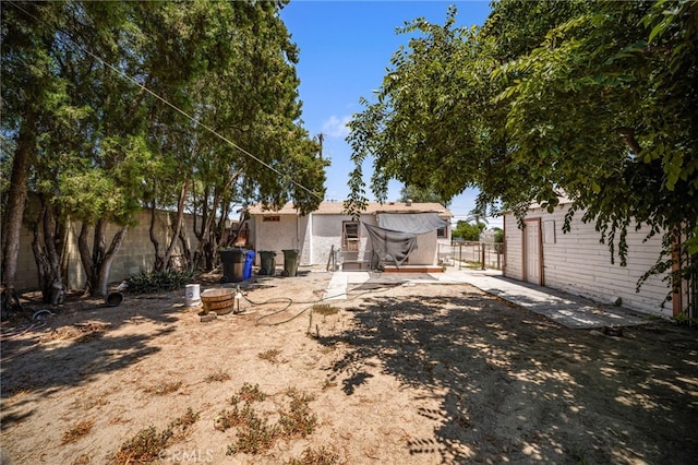 9804 Palmetto Ave, Fontana, CA 92335 - view of yard with a patio area