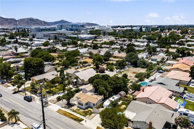9804 Palmetto Ave, Fontana, CA 92335 - aerial view of residential area with a mountainous background