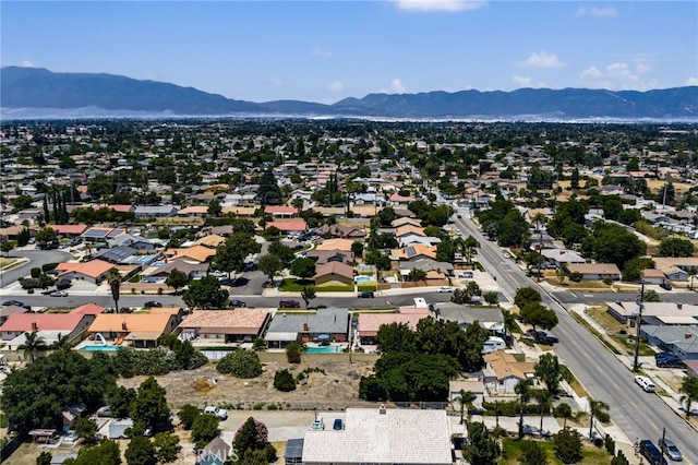 9804 Palmetto Ave, Fontana, CA 92335 - aerial perspective of suburban area with a mountainous background