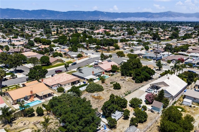 9804 Palmetto Ave, Fontana, CA 92335 - aerial view of residential area with a mountain backdrop