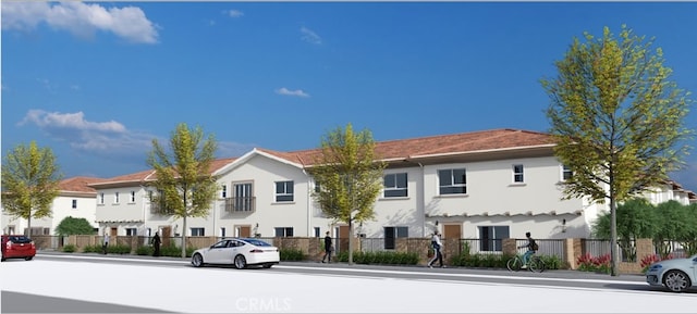 14432 Bing Ave, Fontana, CA 92335 - view of front facade with stucco siding and a residential view