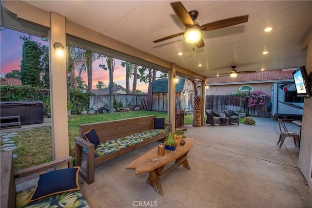 11025 Kenyon Way, Rancho Cucamonga, CA 91701 - fenced backyard featuring a hot tub, a patio, a storage shed, and ceiling fan