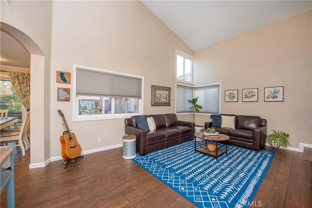 11025 Kenyon Way, Rancho Cucamonga, CA 91701 - living room with high vaulted ceiling, arched walkways, hardwood / wood-style floors, and healthy amount of natural light