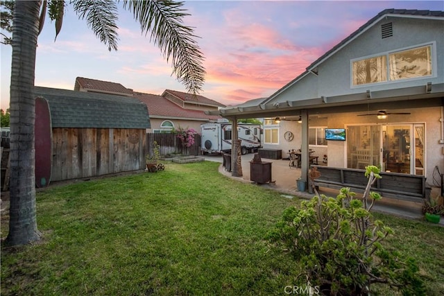 11025 Kenyon Way, Rancho Cucamonga, CA 91701 - view of yard featuring a storage unit, a ceiling fan, and a patio