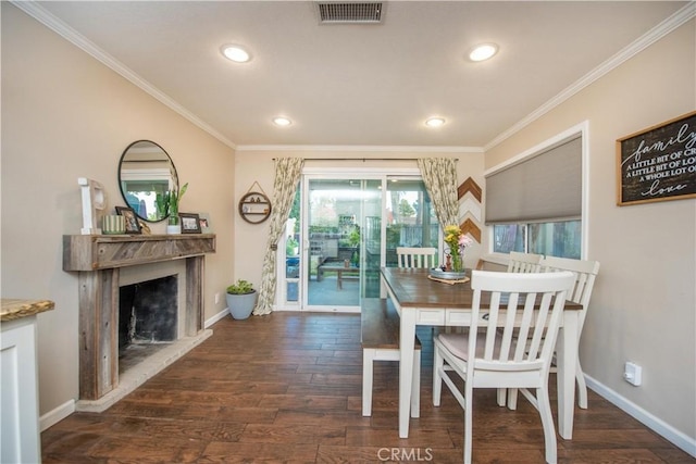11025 Kenyon Way, Rancho Cucamonga, CA 91701 - dining area featuring ornamental molding, a fireplace with raised hearth, wood finished floors, and recessed lighting