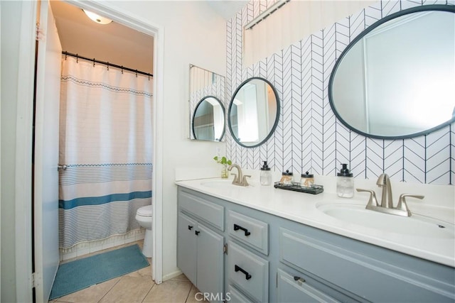 11025 Kenyon Way, Rancho Cucamonga, CA 91701 - bathroom featuring double vanity and tile patterned floors