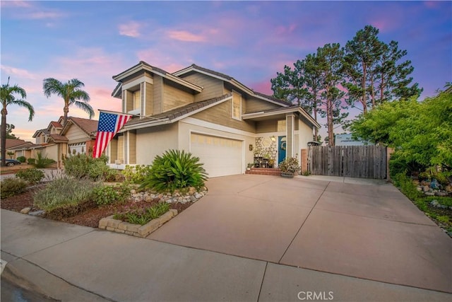 11025 Kenyon Way, Rancho Cucamonga, CA 91701 - mid-century modern home featuring concrete driveway, stucco siding, and a garage