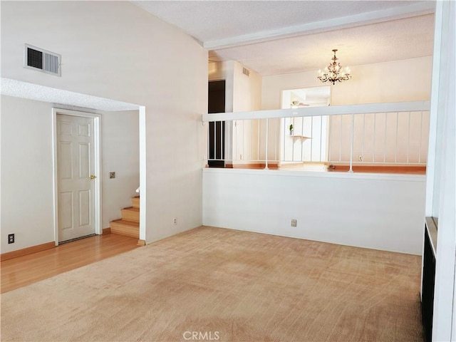 1525 Welldow Ln, Fullerton, CA 92831 - carpeted spare room with a chandelier, stairway, and wood finished floors