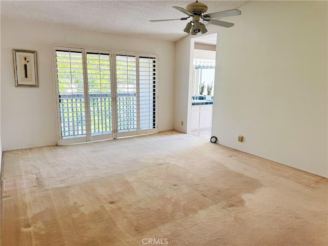 1525 Welldow Ln, Fullerton, CA 92831 - carpeted spare room with ceiling fan, a textured ceiling, and vaulted ceiling