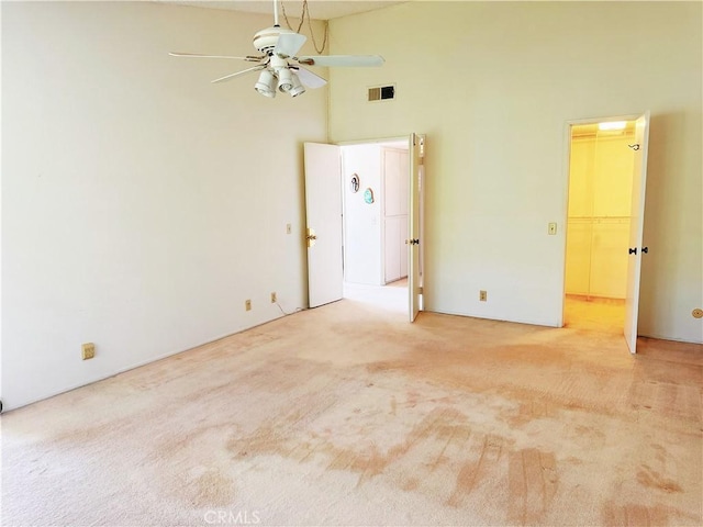 1525 Welldow Ln, Fullerton, CA 92831 - spare room with a ceiling fan, a high ceiling, and light colored carpet