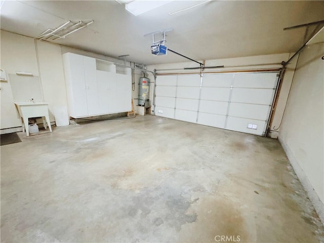 1525 Welldow Ln, Fullerton, CA 92831 - garage featuring a garage door opener and secured water heater
