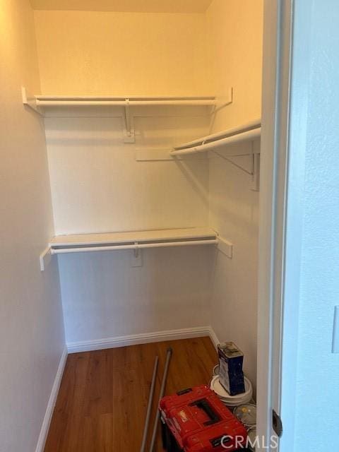 535 Magnolia Ave Unit 101, Long Beach, CA 90802 - walk in closet with wood finished floors