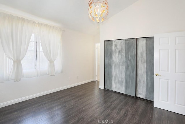 1419 W 179th St Unit 3, Gardena, CA 90248 - unfurnished bedroom featuring dark wood-type flooring, vaulted ceiling, a closet, and a chandelier