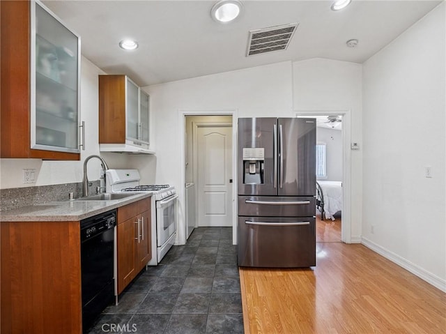 14719 Juniper St, Hesperia, CA 92345 - kitchen with stainless steel fridge, dishwasher, white range with gas cooktop, under cabinet range hood, and glass insert cabinets