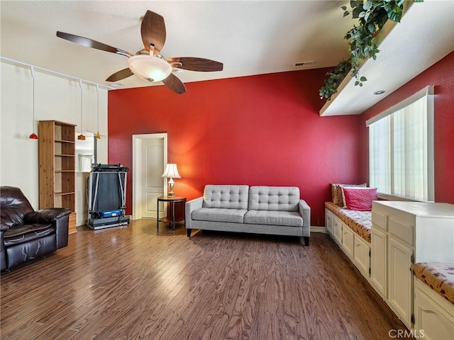 14719 Juniper St, Hesperia, CA 92345 - living room with dark wood-style flooring and a ceiling fan