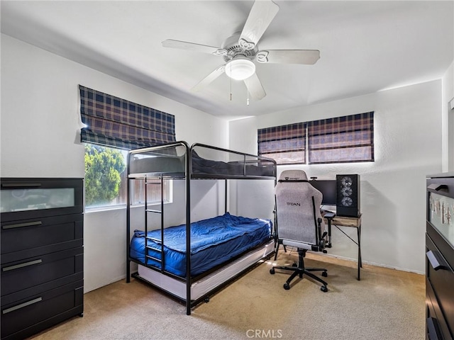 14719 Juniper St, Hesperia, CA 92345 - bedroom featuring carpet floors, a ceiling fan, and an office area