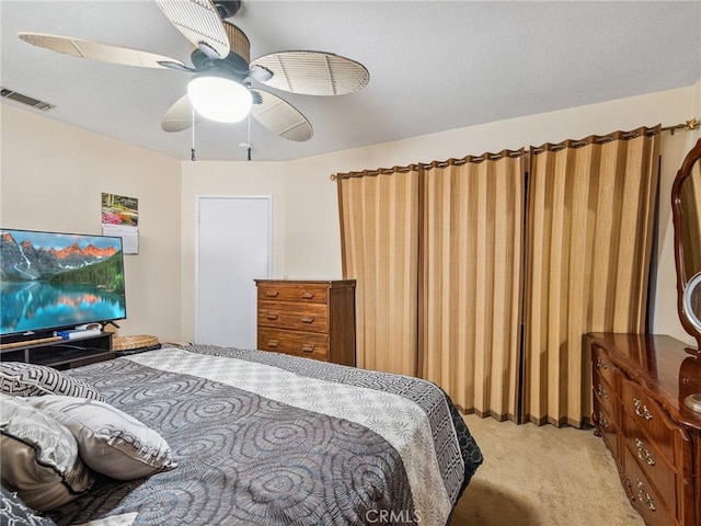 14719 Juniper St, Hesperia, CA 92345 - bedroom with light carpet and a ceiling fan
