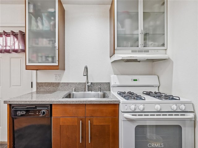 14719 Juniper St, Hesperia, CA 92345 - kitchen with gas range gas stove, black dishwasher, under cabinet range hood, brown cabinetry, and glass insert cabinets
