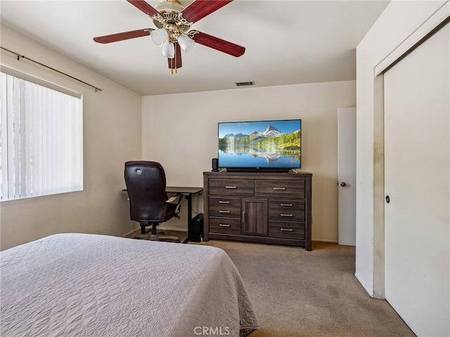 14719 Juniper St, Hesperia, CA 92345 - bedroom featuring light colored carpet and ceiling fan