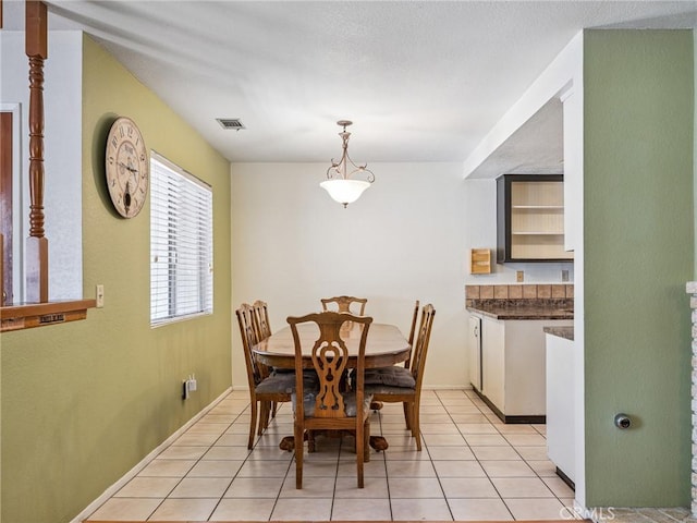 14719 Juniper St, Hesperia, CA 92345 - dining area with light tile patterned floors