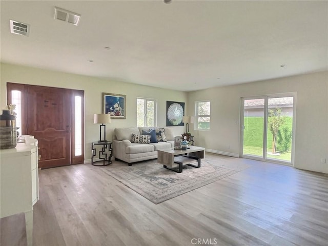 378 W Rosa Parks Rd, Palm Springs, CA 92262 - living area with light wood-style floors and baseboards