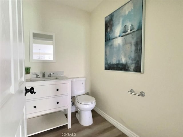 378 W Rosa Parks Rd, Palm Springs, CA 92262 - bathroom with vanity and wood finished floors