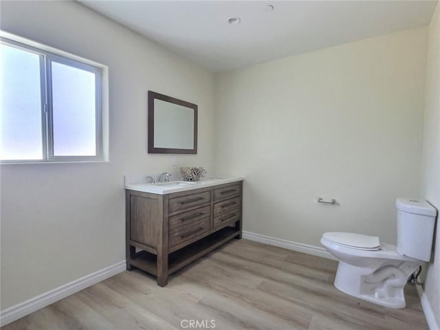 378 W Rosa Parks Rd, Palm Springs, CA 92262 - bathroom with vanity and wood finished floors