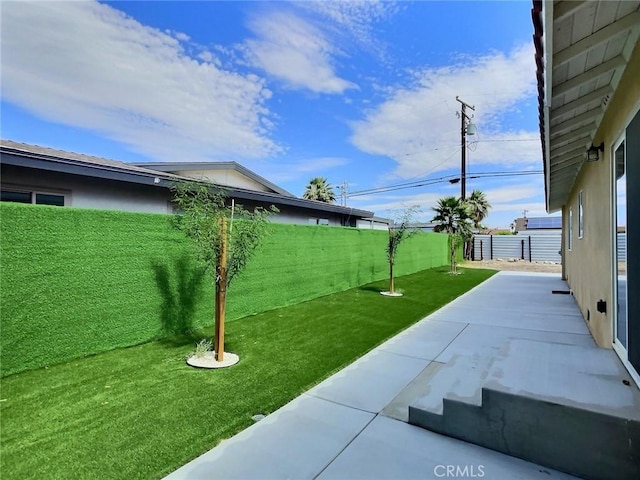 378 W Rosa Parks Rd, Palm Springs, CA 92262 - fenced backyard with a patio