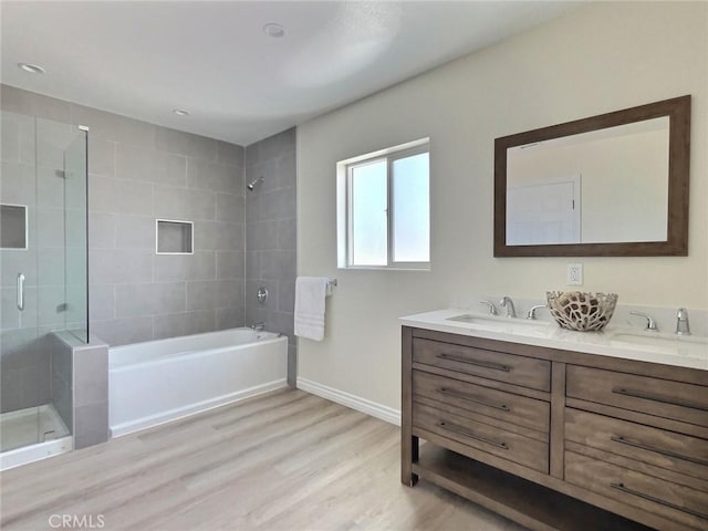 378 W Rosa Parks Rd, Palm Springs, CA 92262 - bathroom featuring double vanity and wood finished floors